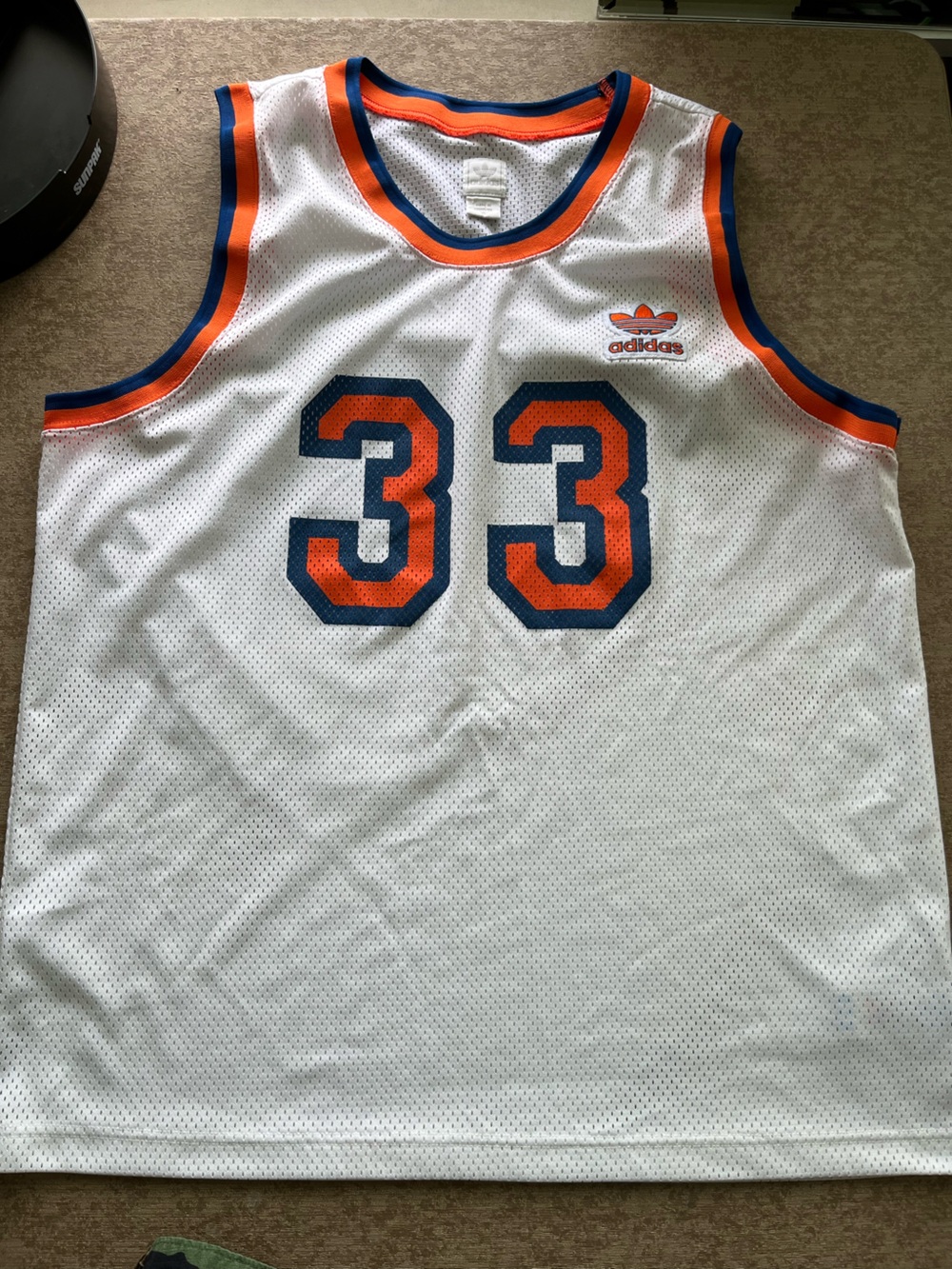 vintage Adidas New York Knicks jersey featuring Patrick Ewing's number 33